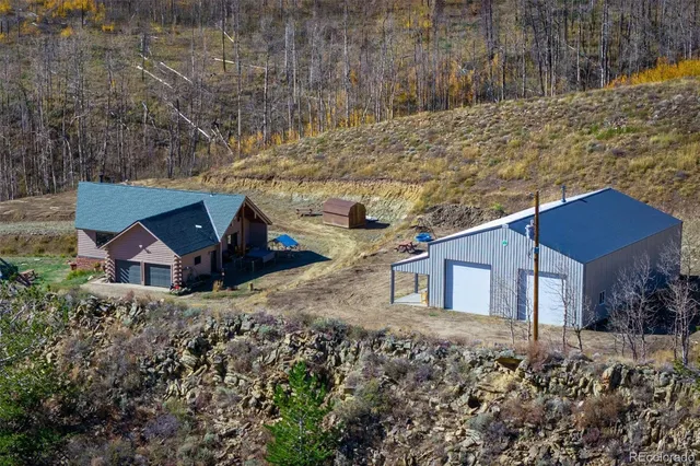 a house with trees in front of it