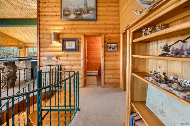 a view of balcony with furniture