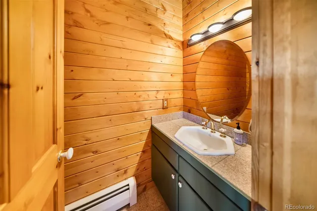 a bathroom with a toilet and shower