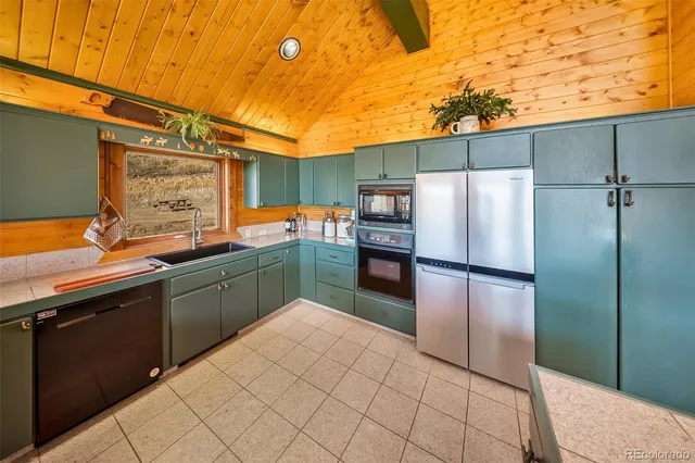 a view of a backyard with sitting area