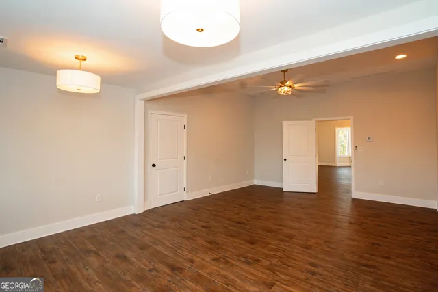 a bathroom with a shower and a toilet