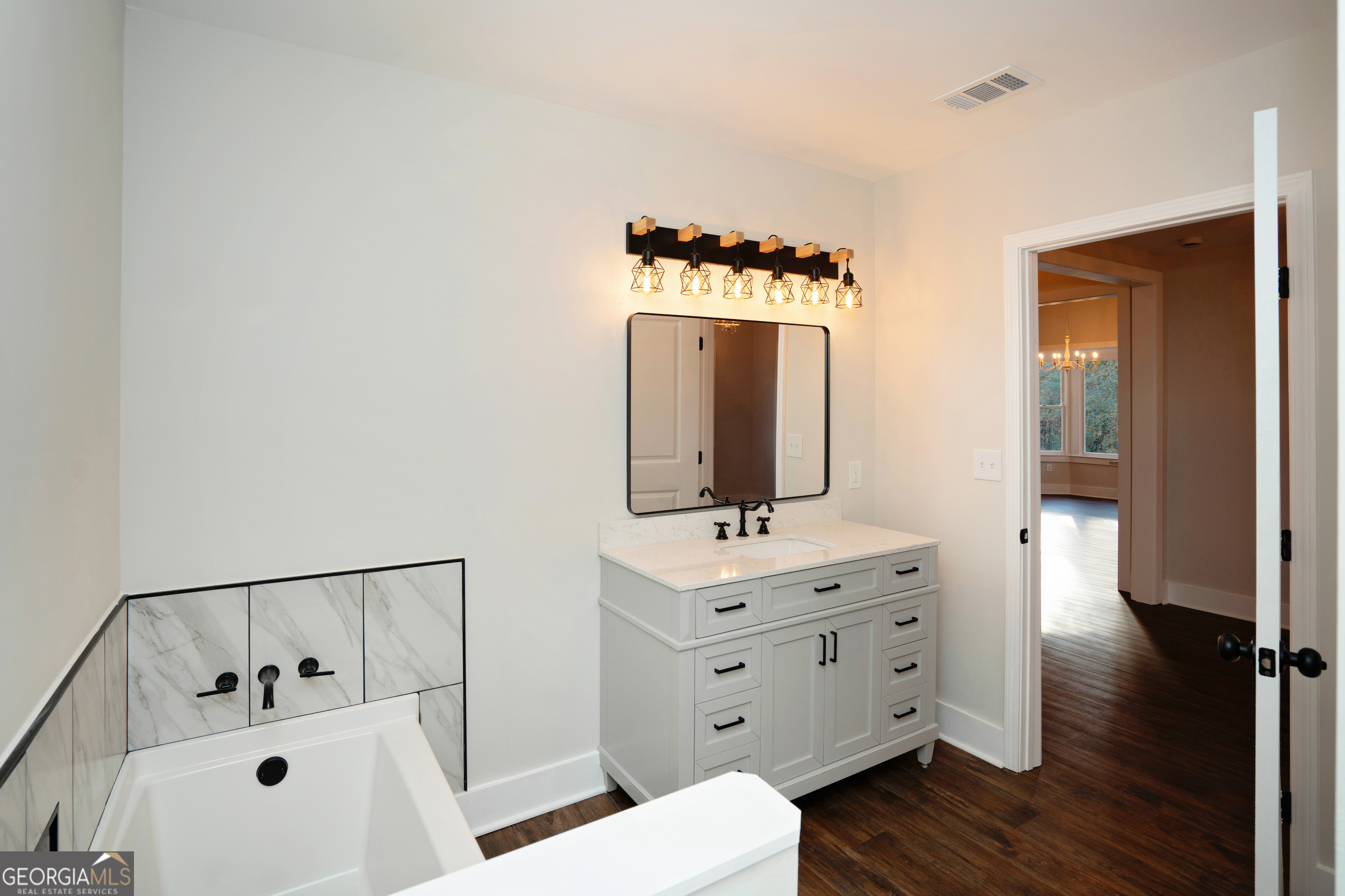269 Martin Dairy Road Milner, GA 30257 - Photo 37 of 71 a bathroom with a sink and a mirror
