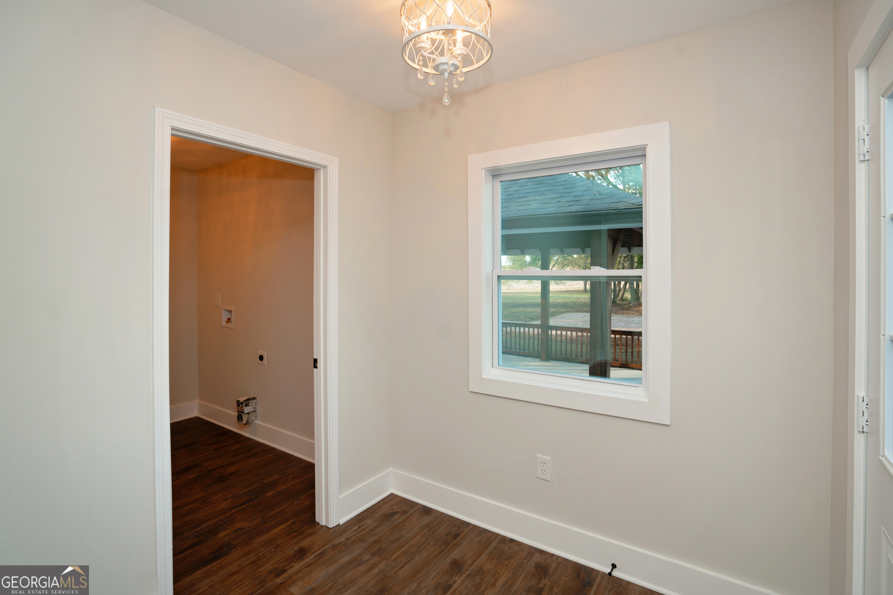 269 Martin Dairy Road Milner, GA 30257 - Photo 41 of 71 a view of a hallway to room with wooden floor