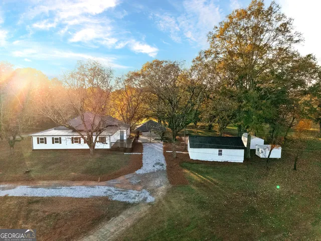 a view of a yard with an outdoor space