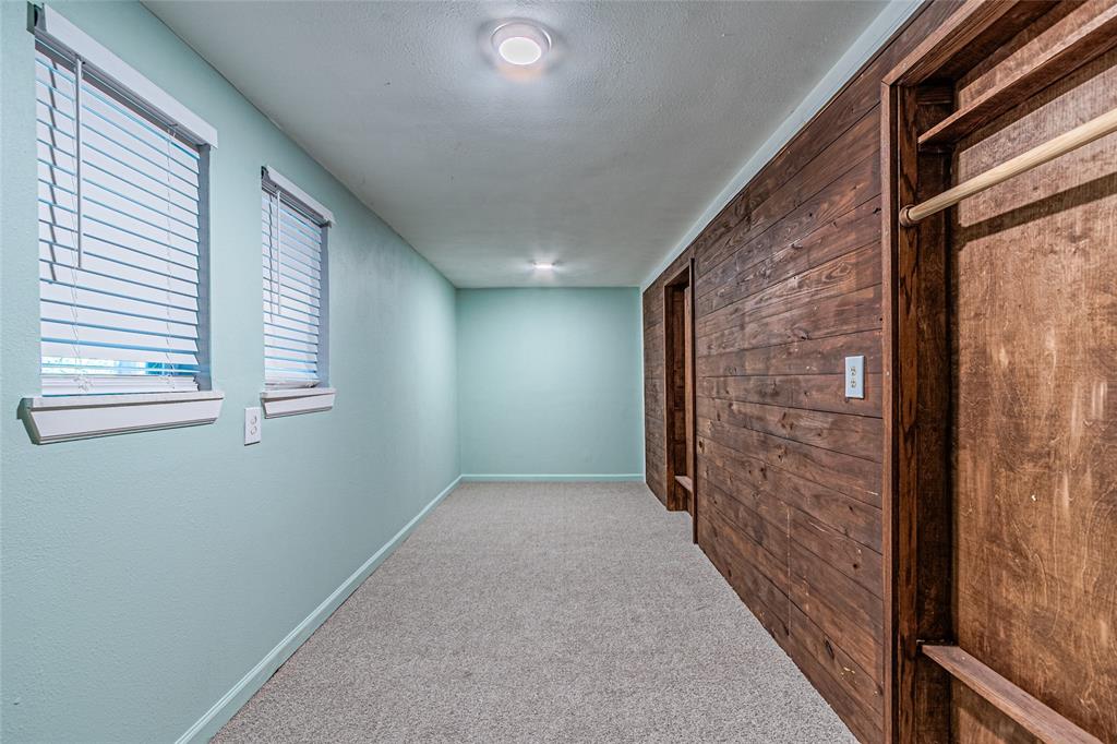 605 Lloyd Italy, TX 76651 - Photo 25 of 30 a view of hallway with brick walls