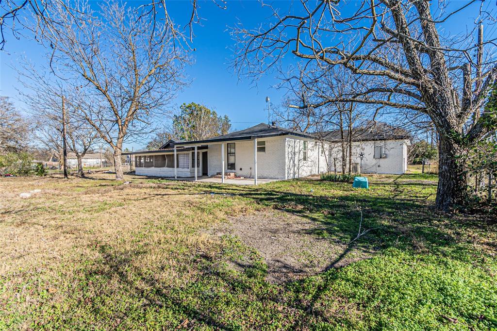 605 Lloyd Italy, TX 76651 - Photo 29 of 30 a front view of a house with a yard