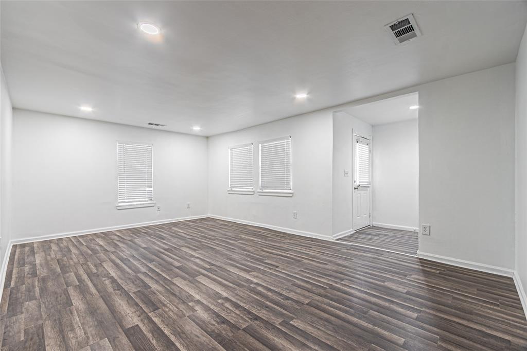 605 Lloyd Italy, TX 76651 - Photo 6 of 30 a view of an empty room with wooden floor