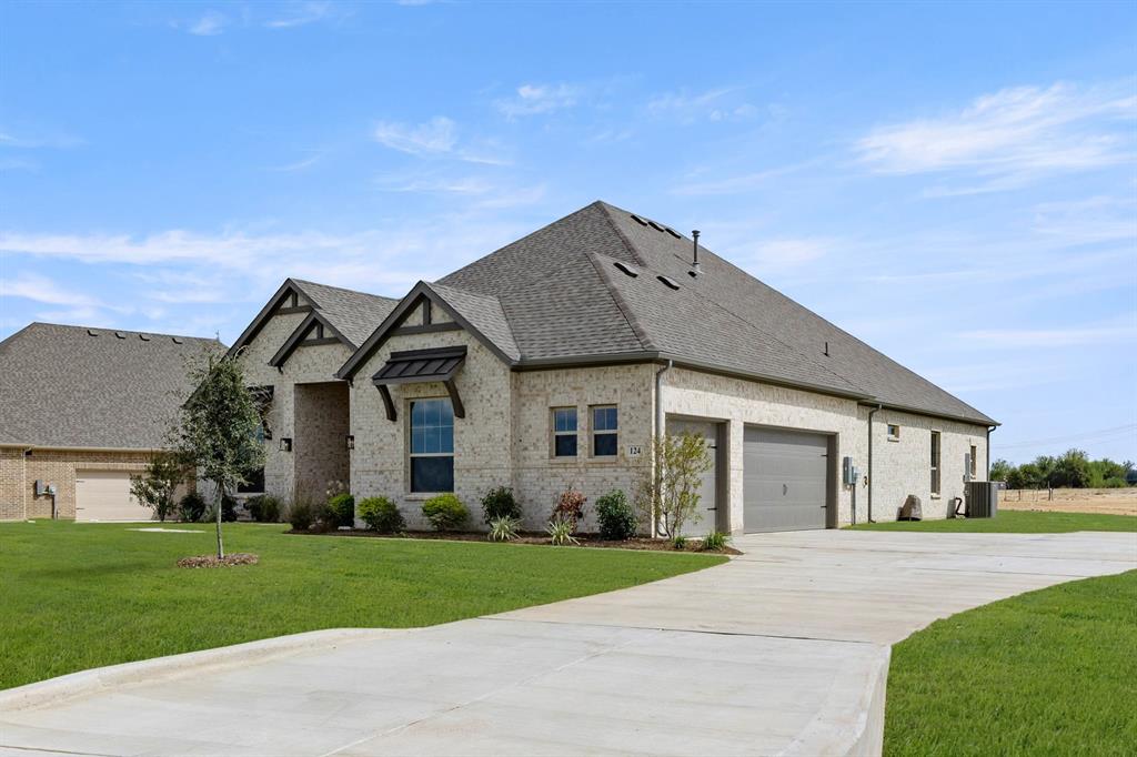 124 Evanston Court Rhome, TX 76078 - Photo 2 of 28 124 Evanston-Front-2