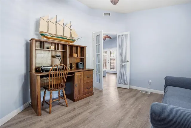 a view of livingroom with furniture and wooden floor