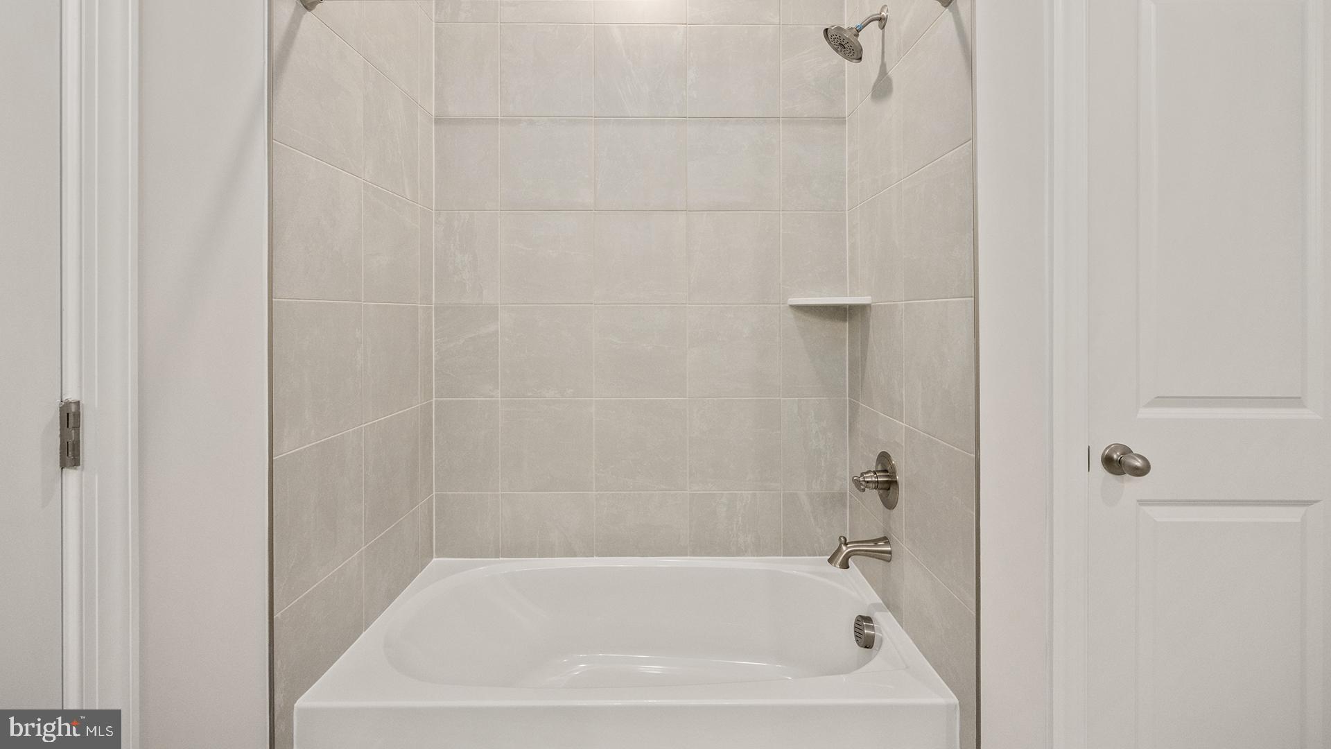 14018 Northern Vw Road Culpeper, VA 22701 - Photo 17 of 27 a white bath tub with a shower