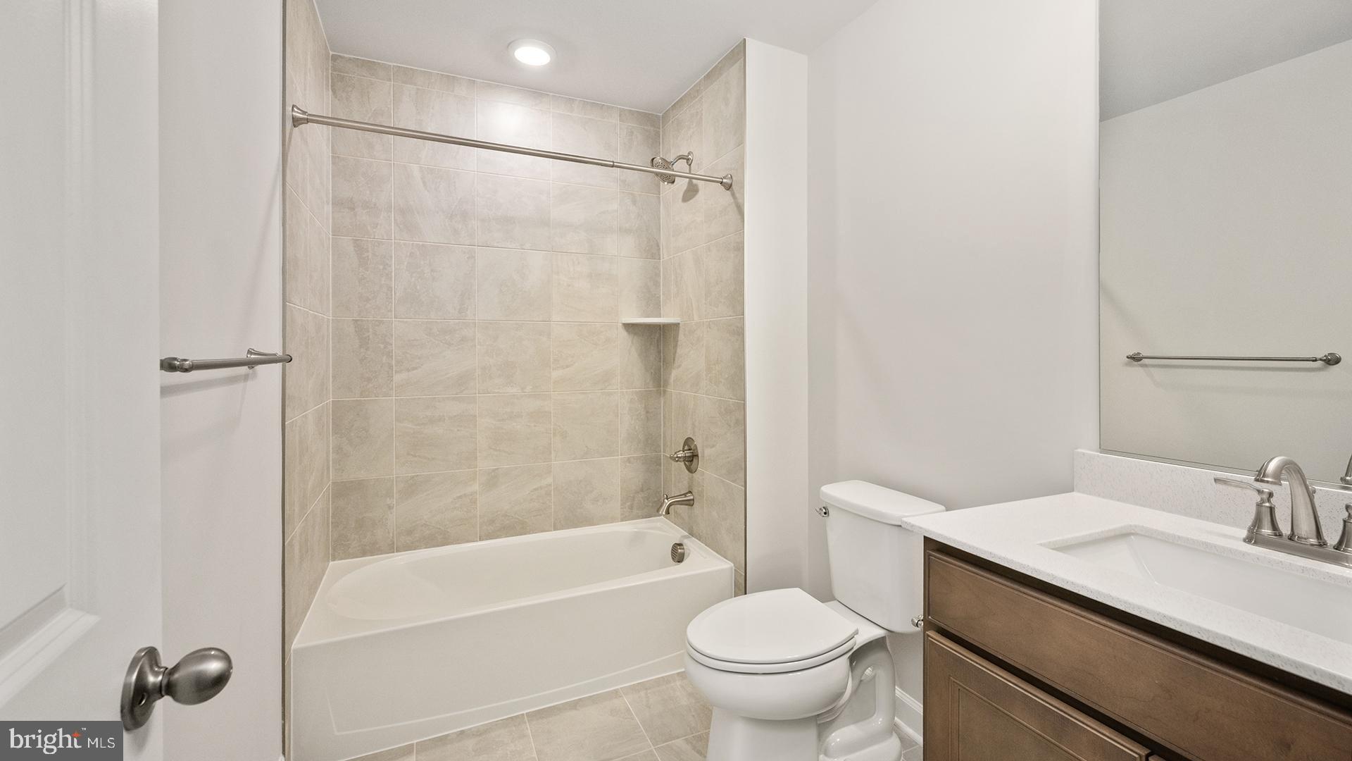14018 Northern Vw Road Culpeper, VA 22701 - Photo 23 of 27 a bathroom with a sink toilet and shower