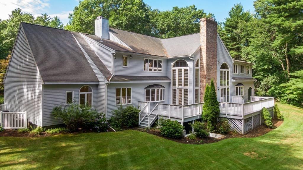 84 French Road Sudbury, MA 01776 - Photo 5 of 36 a front view of a house with a yard