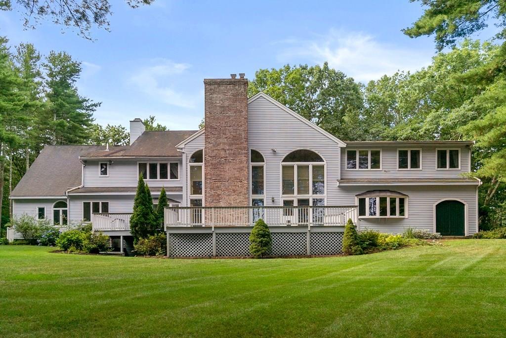 84 French Road Sudbury, MA 01776 - Photo 9 of 36 a front view of a house with a garden