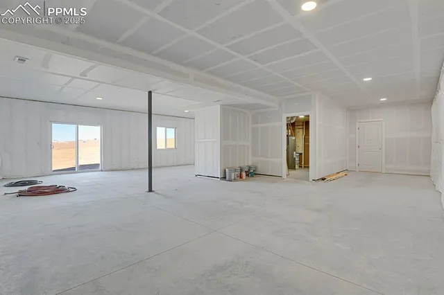 a view of a bathroom with a shower and a tub