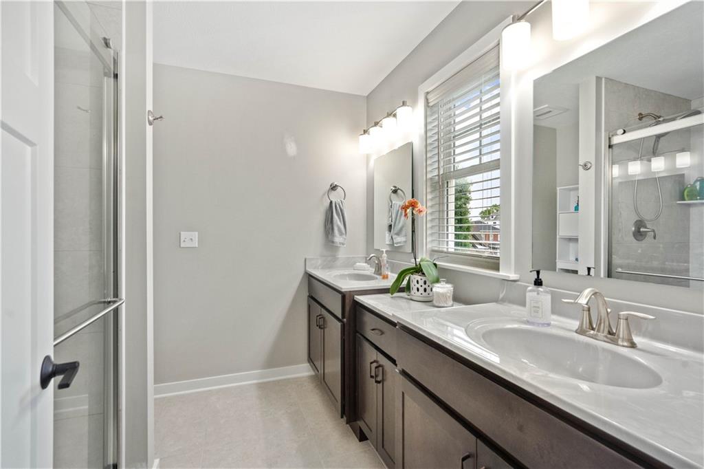 414 Friday Road Pittsburgh, PA 15209 - Photo 14 of 24 a bathroom with a granite countertop sink and a mirror