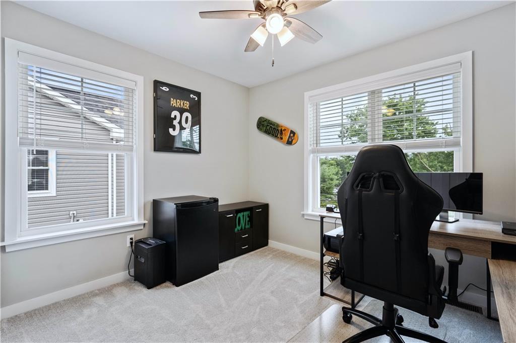 414 Friday Road Pittsburgh, PA 15209 - Photo 15 of 24 a view of a workspace with furniture and a window