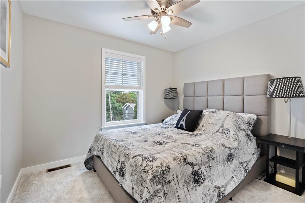 414 Friday Road Pittsburgh, PA 15209 - Photo 16 of 24 a bedroom with a bed and a window