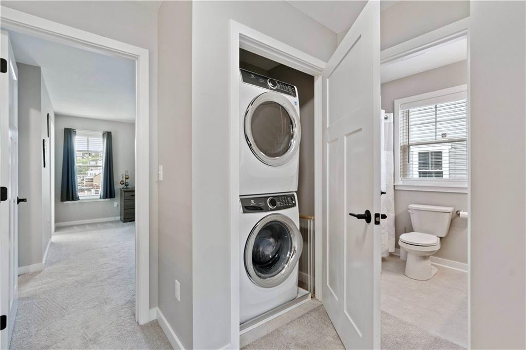 414 Friday Road Pittsburgh, PA 15209 - Photo 17 of 24 a utility room with sink dryer and washer