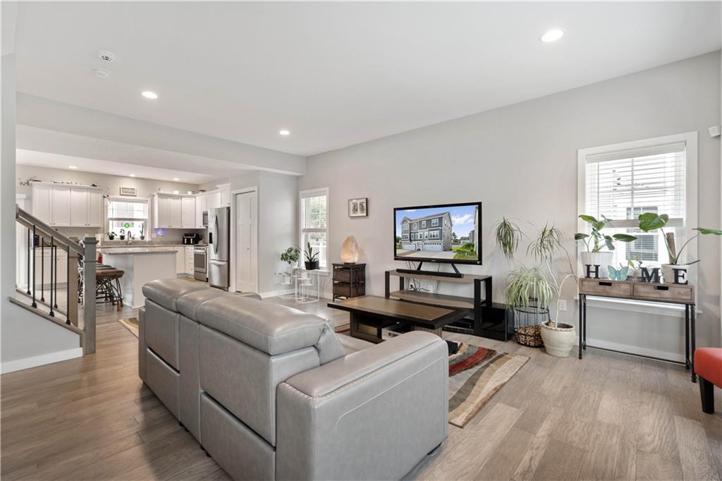 414 Friday Road Pittsburgh, PA 15209 - Photo 2 of 24 a living room with furniture and a flat screen tv