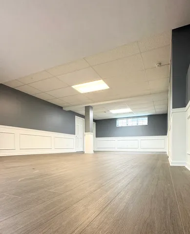 a view of a chairs on the roof deck