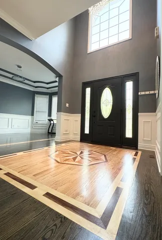 a view of a livingroom with wooden floor