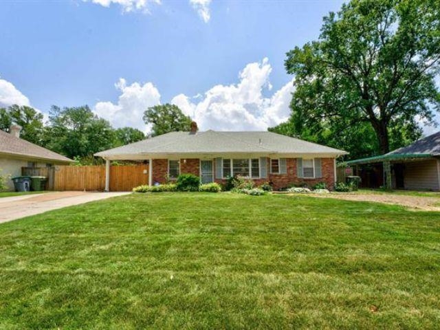 A cozy and versatile home with a spacious den, wood-burning fireplace, and charming original features. Relax in the fenced backyard, entertain under the covered patio, and make this peaceful East Memphis home your own.