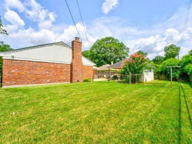1694 South White Station Road Memphis, TN 38117 - Photo 25 of 26 A fully fenced yard with room to relax, garden, or play.