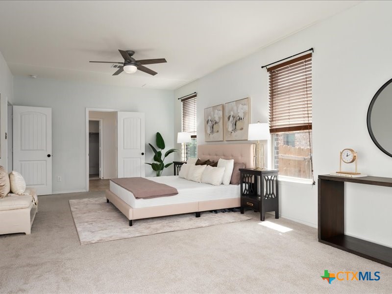 18817 Star Gazer Way Pflugerville, TX 78660 - Photo 21 of 36 a living room with furniture and windows