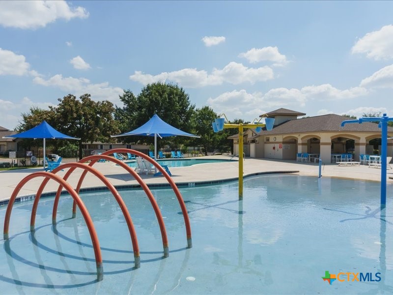 18817 Star Gazer Way Pflugerville, TX 78660 - Photo 36 of 36 a view of swimming pool with a yard