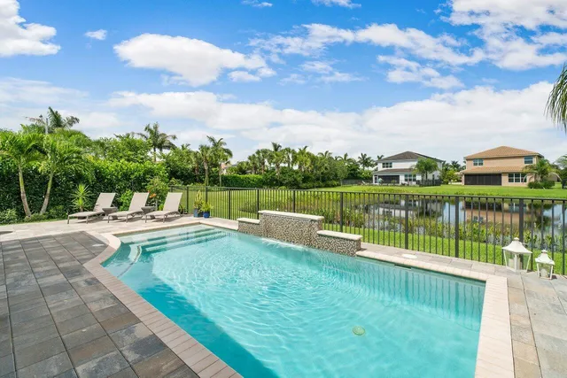 a view of a lake with a garden and lake view