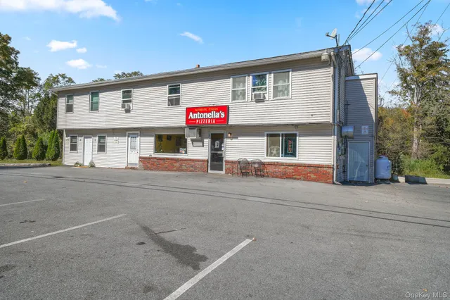 front view of a house with a street