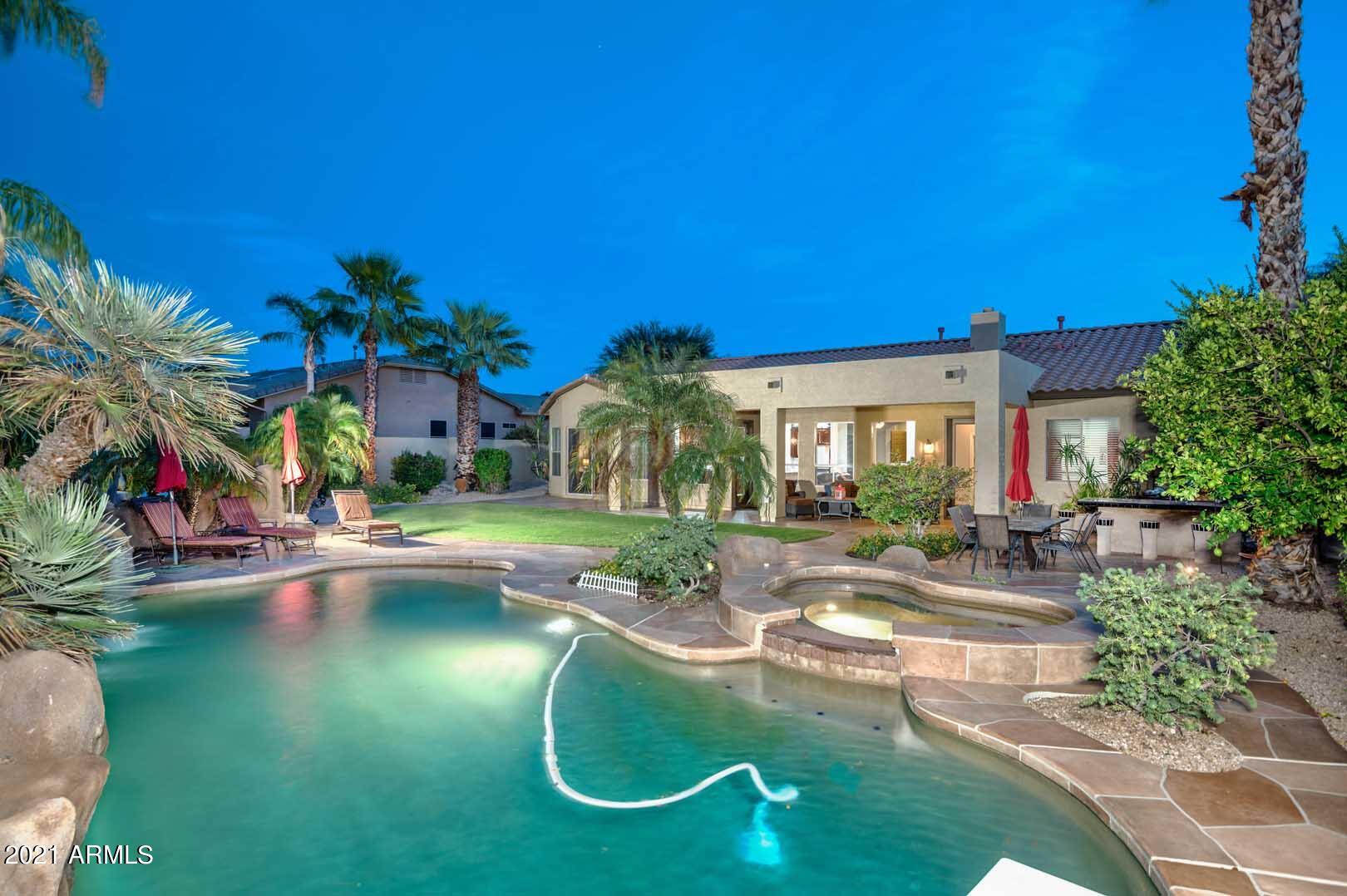 4640 West Rowel Road Phoenix, AZ 85083 - Photo 16 of 48 Night-Pool-Backyard