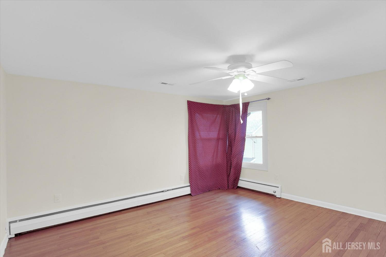434 Ridge Road Dayton, NJ 08810 - Photo 29 of 46 a view of a livingroom with a chandelier fan
