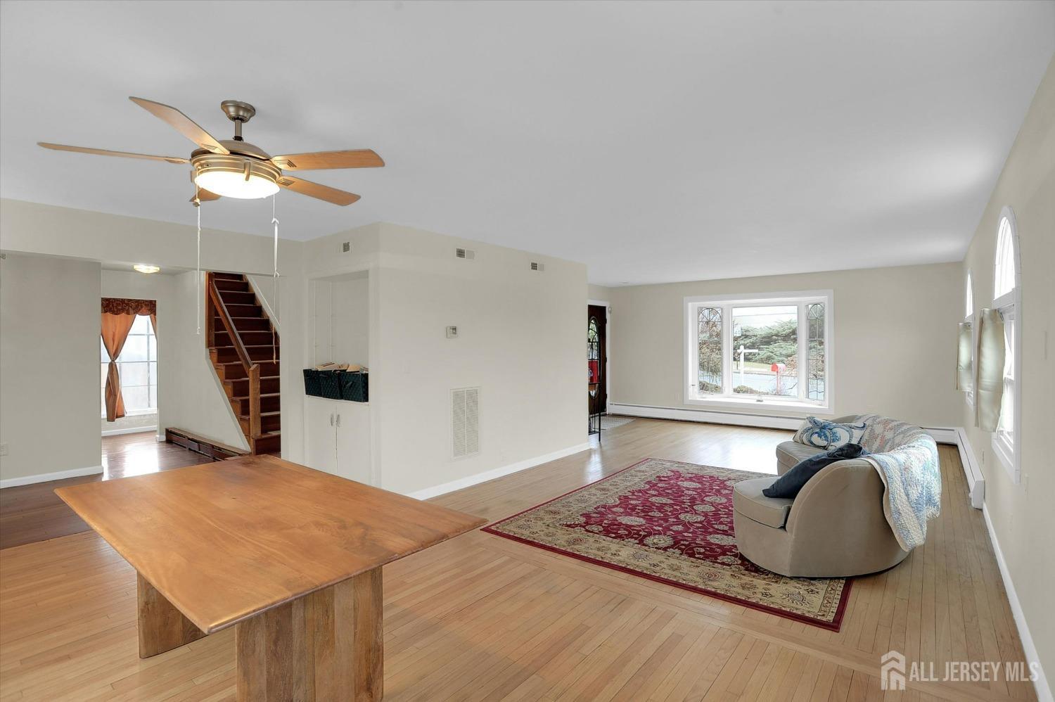 434 Ridge Road Dayton, NJ 08810 - Photo 4 of 46 a living room with furniture and wooden floor
