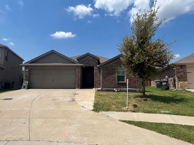 515 Rustic Meadows Trail Princeton, TX 75407 - Photo 1 of 29 a front view of a house with a yard and garage