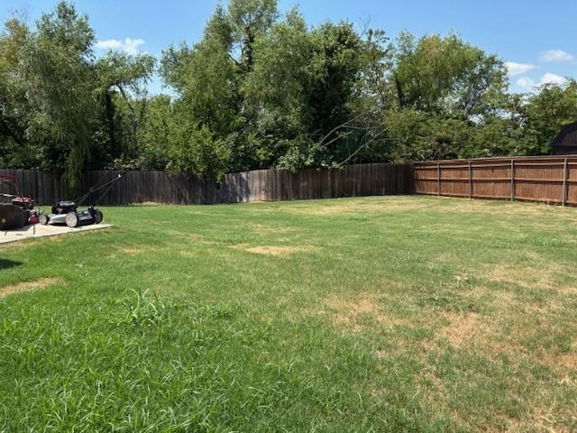 515 Rustic Meadows Trail Princeton, TX 75407 - Photo 24 of 29 a backyard of a house with lots of green space