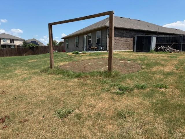 515 Rustic Meadows Trail Princeton, TX 75407 - Photo 28 of 29 a view of a house with backyard and porch