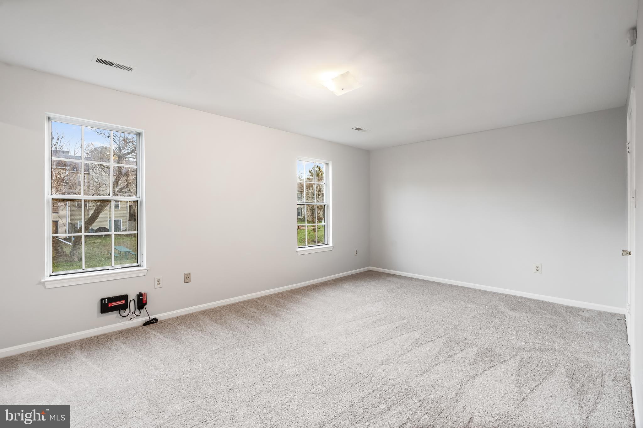 10322 Castlehedge Terrace Silver Spring, MD 20902 - Photo 13 of 25 an empty room with a window