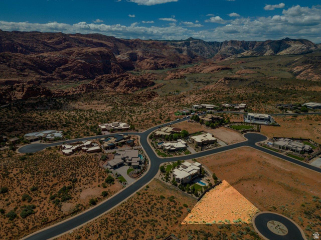 Basalt Cir Street, Unit 1027 St. George, UT 84770 - Photo 5 of 29 Aerial view of property's location featuring mountains and nearby suburban area