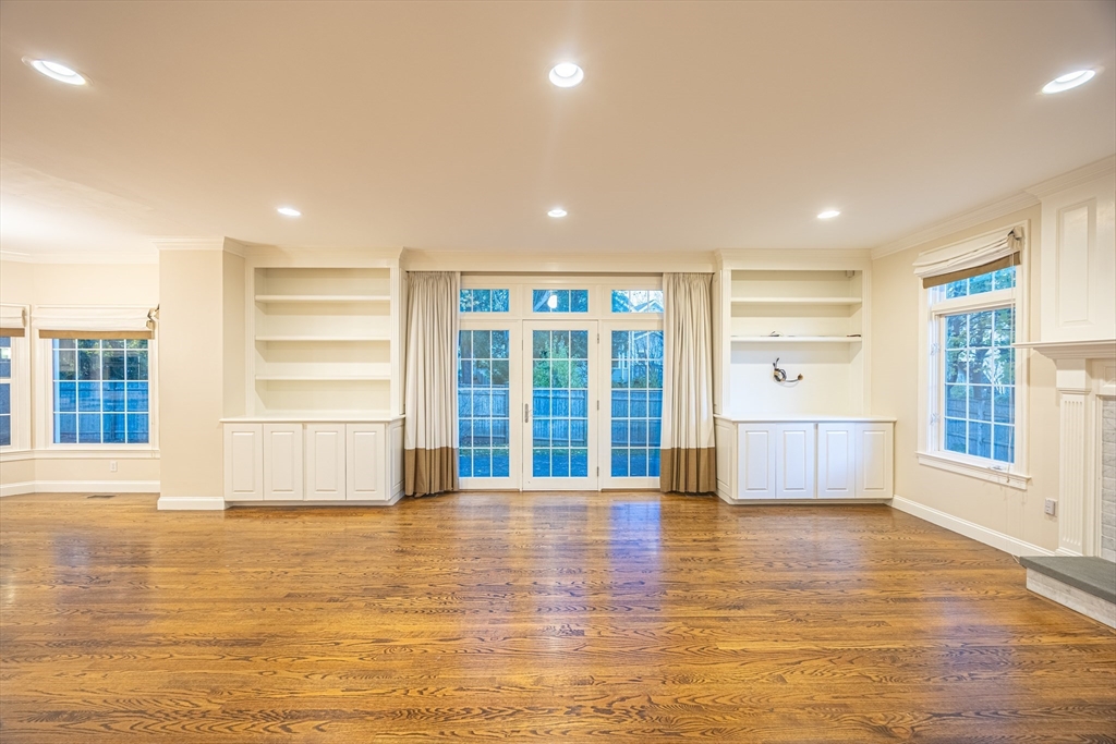 27 Mellon Road Wellesley, MA 02482 - Photo 7 of 42 a view of an empty room with a window