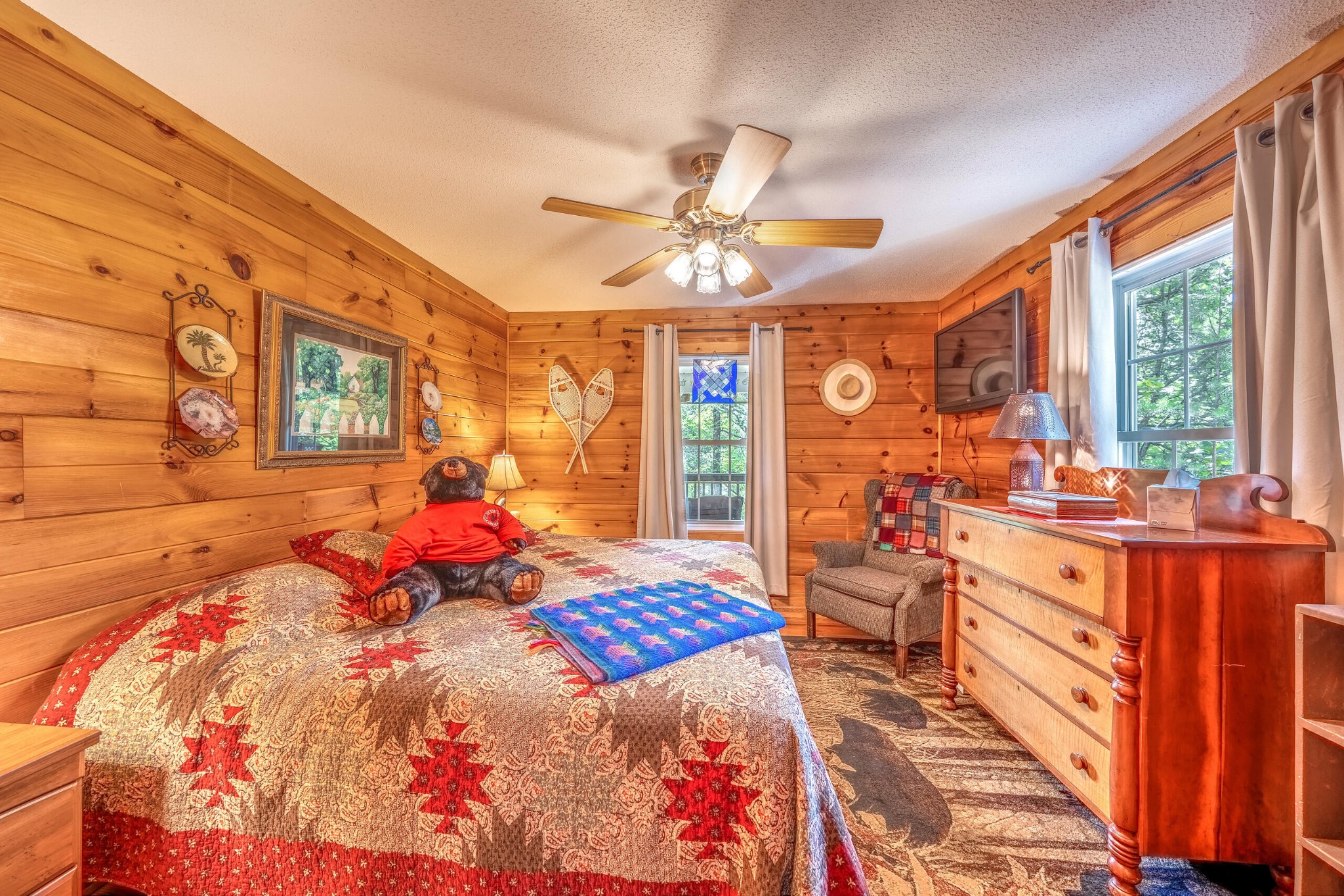 260 Deer Ridge Trail Ocoee, TN 37361 - Photo 55 of 72 a bed sitting in a bedroom next to a window