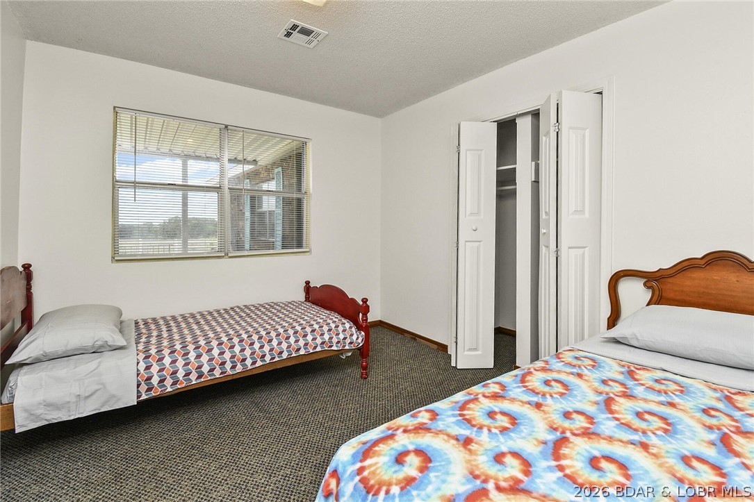 194 State Hwy MM Niangua, MO 65713 - Photo 27 of 32 Bedroom #4 with view of patio