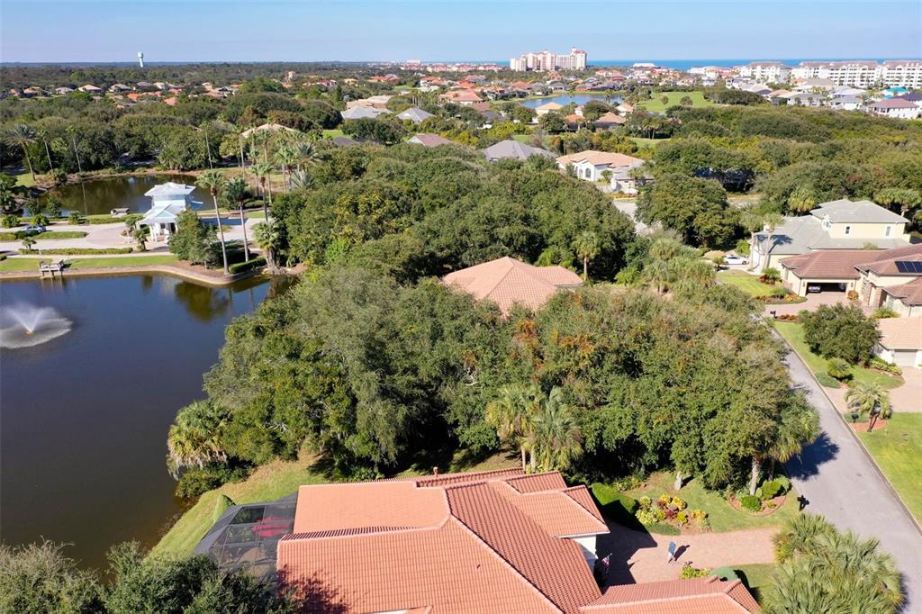 8 Flagship Drive Palm Coast, FL 32137 - Photo 11 of 31 an aerial view of a house with a yard