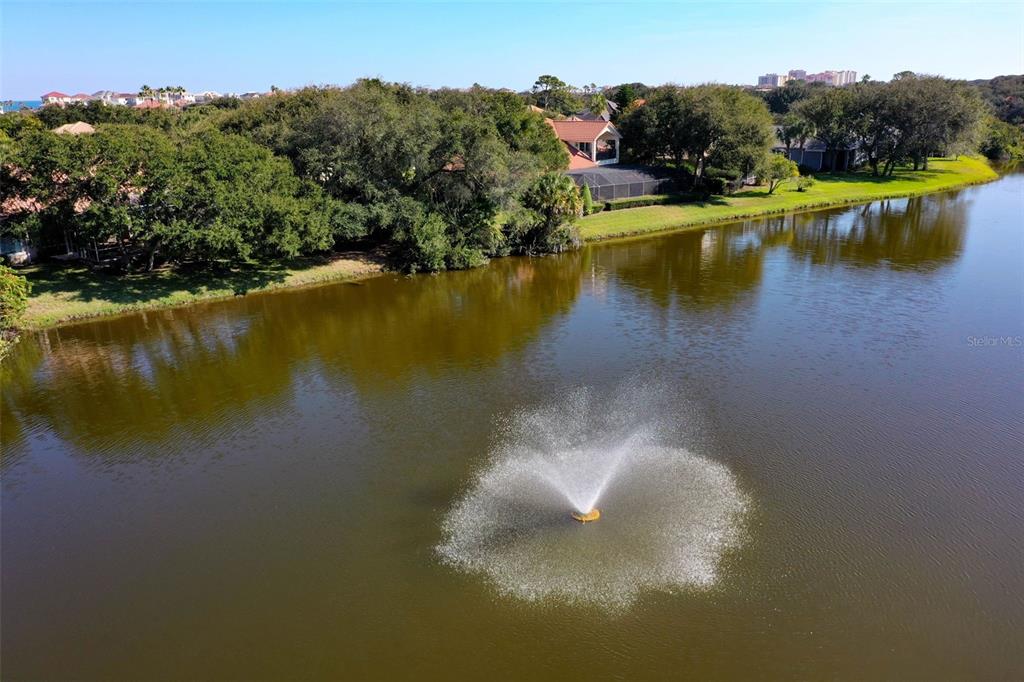 8 Flagship Drive Palm Coast, FL 32137 - Photo 16 of 31 a view of a lake in middle of the town
