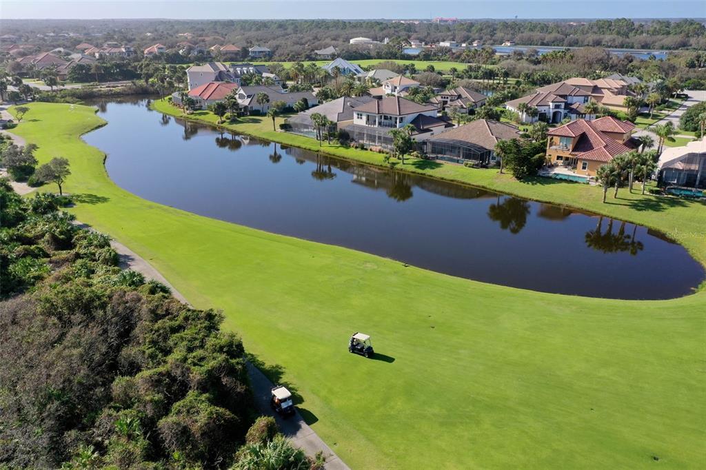 8 Flagship Drive Palm Coast, FL 32137 - Photo 24 of 31 an aerial view of residential houses with outdoor space