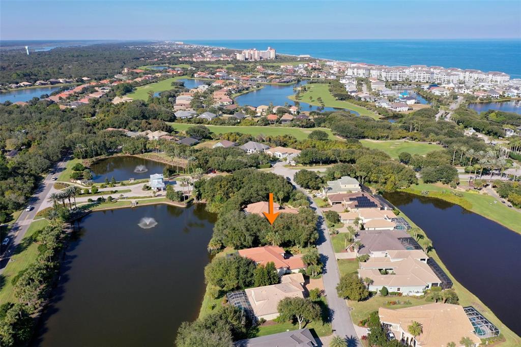 8 Flagship Drive Palm Coast, FL 32137 - Photo 5 of 31 an aerial view of residential houses with outdoor space