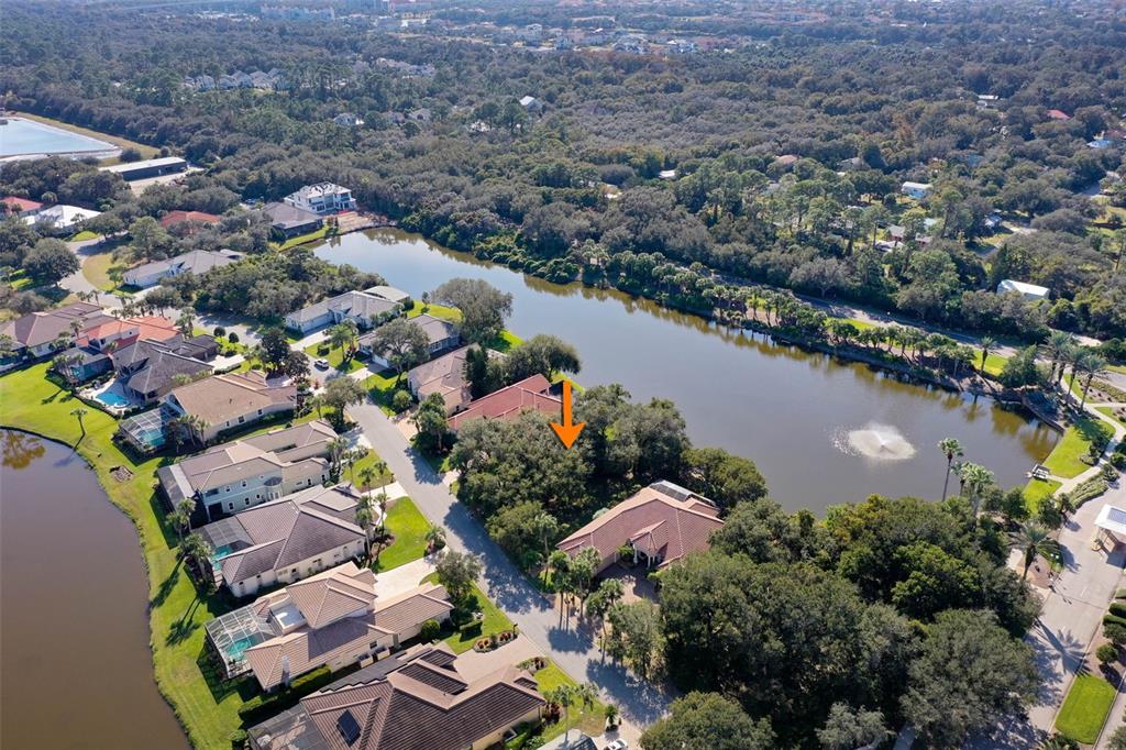 8 Flagship Drive Palm Coast, FL 32137 - Photo 7 of 31 an aerial view of house with yard swimming pool and outdoor seating