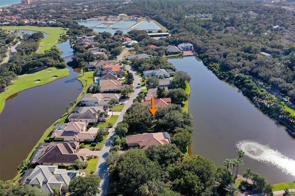 8 Flagship Drive Palm Coast, FL 32137 - Photo 8 of 31 an aerial view of residential house with outdoor space and swimming pool