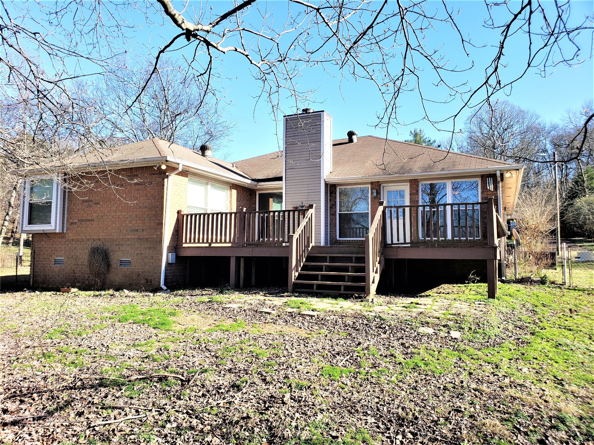 1737 Ridgemere Court Hermitage, TN 37076 - Photo 14 of 14 a house that has a tree in front of it