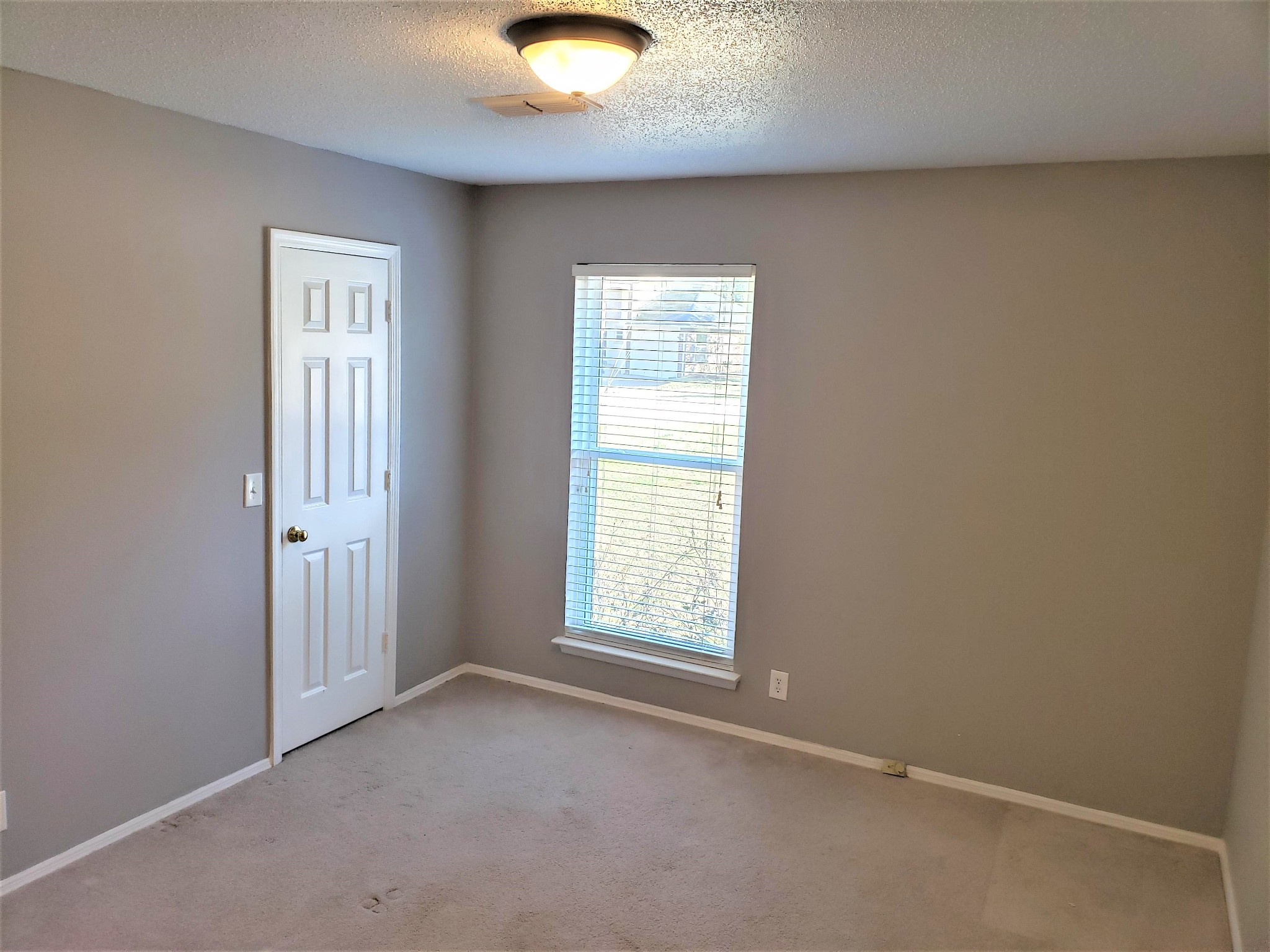 1737 Ridgemere Court Hermitage, TN 37076 - Photo 10 of 14 an empty room with windows